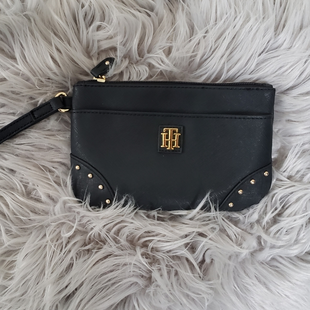 Black Tommy Hilfiger Wristlet with gold accents